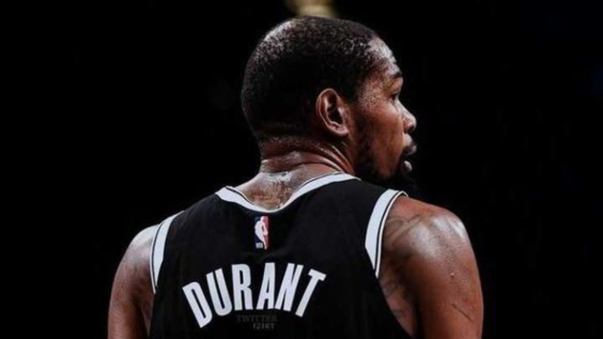 Kevin Durant wearing their black jersey.