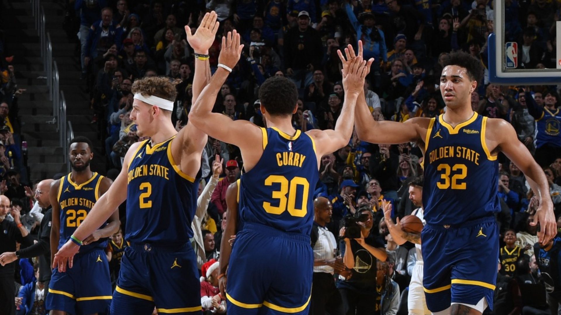 Golden State Warriors Players Giving a High Five to Each Other