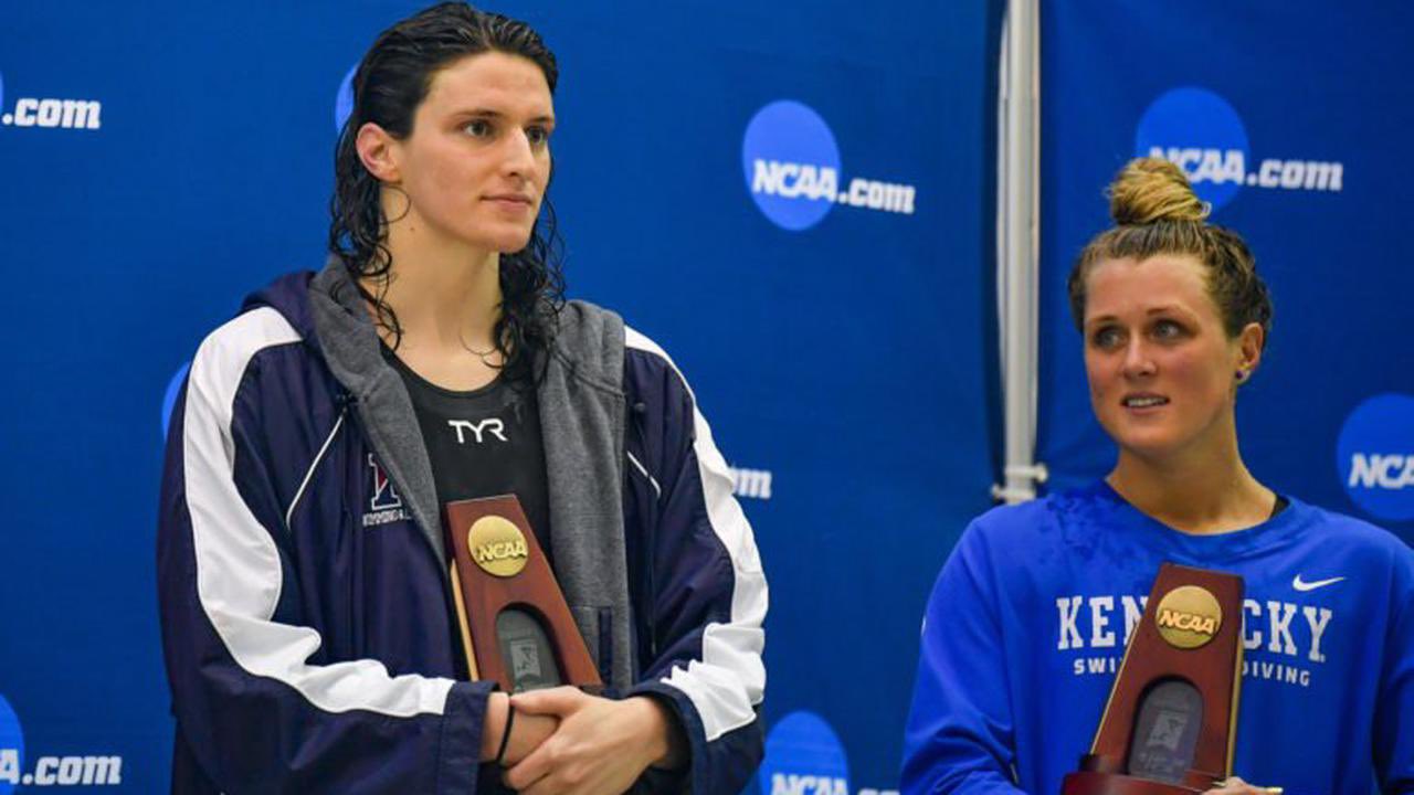 An image of Riley Gaines standing beside Lia Thomas back in 2022